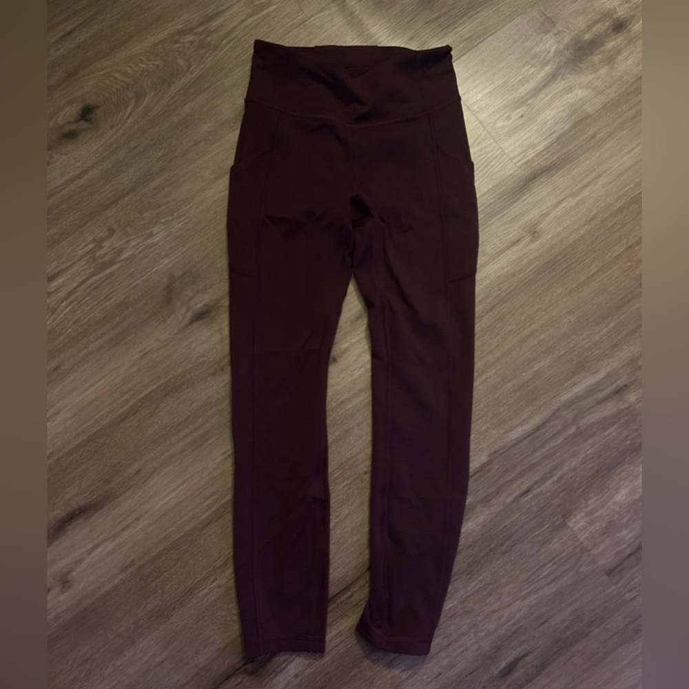 Worn a few times, no tag, either size 2 or 4, burgundy color